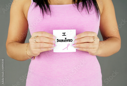 Woman survivor with paper - 69951598