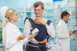 Pharmacy chemist, father and child in drugstore Pharmacy chemist, father and child in drugstore