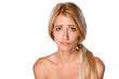 dissatisfied and sad young blonde on white background