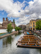 Punts lined up on river in Cambridge England Punts lined up on river in Cambridge England