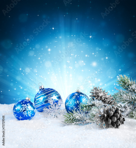 magic of christmas - blue balls on snow.