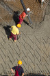 Construction workers casting foundations of hydro power plant Construction workers casting foundations of hydro power plant