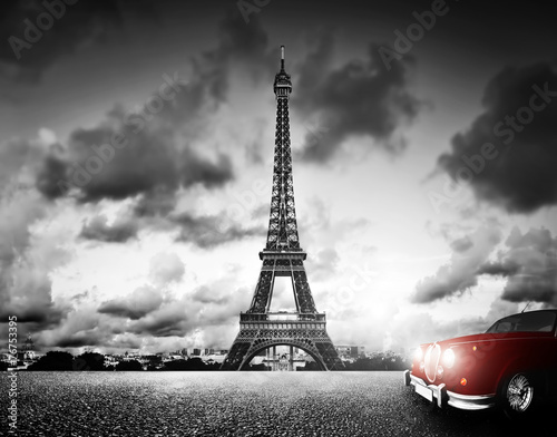 Effel Tower, Paris, France and retro red car. Black and white