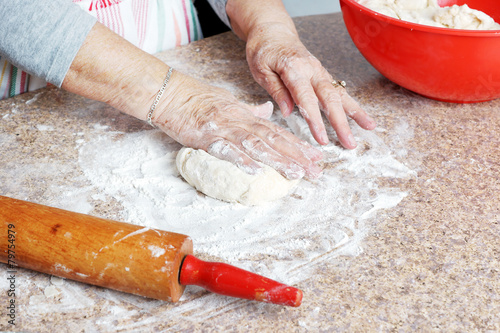 Making dough for pie crust - 79754979