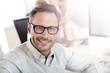 Portrait of smiling businessman with eyeglasses Portrait of smiling businessman with eyeglasses