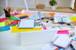Designer's table with notes and tools Designer's table with notes and tools