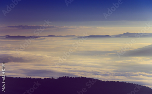 Beautiful foggy morning  in the mountains.