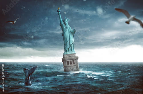 Fototapeta Statue of Liberty sinks in the ocean
