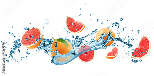  grapefruets in water splash isolated on the white background