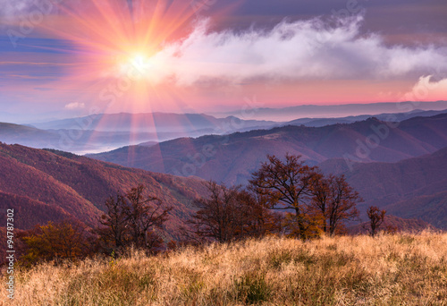 Colorful sunrise in the autumn mountains.
