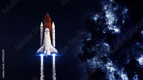 Plakat Wahadłowiec startujący z misją. Elementy tego obrazu dostarczone przez NASA