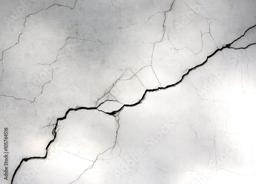 white wall with cracks