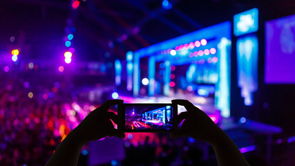 Take photo concert in front of stage