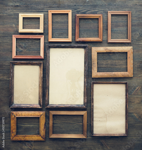 frames on wooden wall