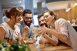 Group of friends taking selfie pictures in bar Group of friends taking selfie pictures in bar
