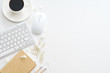 Office desk table with computer, supplies and coffee cup Office desk table with computer, supplies and coffee cup