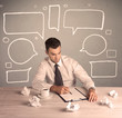Busy office worker with drawn text bubbles Busy office worker with drawn text bubbles