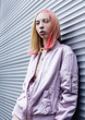 young pretty fashion dressed blong teenage girl posing friendly outside, lifestyle people concept young pretty fashion dressed blong teenage girl posing friendly outside, lifestyle people concept