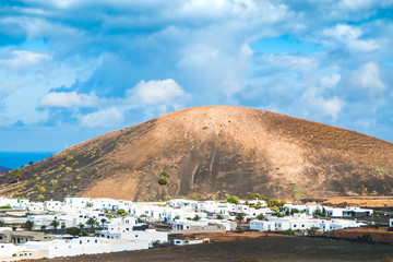 Yaiza white houses village under volcanic mountains.  Lanzarote. Canary Islands. Spain