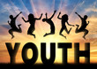 Silhouette people jumping over the word youth Silhouette people jumping over the word youth