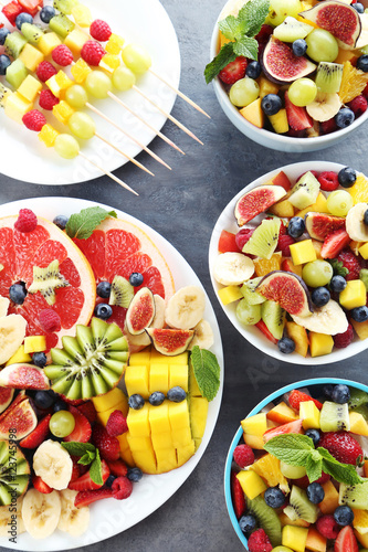 Fresh fruit salad on a grey wooden table