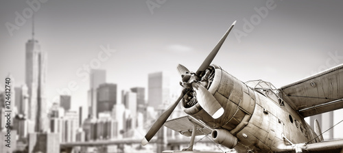Fototapeta biplane against a skyline