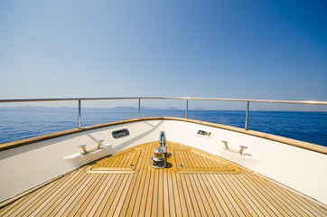 Wide angle shot of front of the yacht in summer time