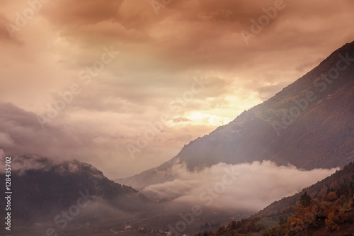 Obraz na płótnie Beautiful pink sunset in the mountains. Italian Alps in South Ty