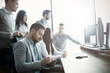 Group of business people and software developers working Group of business people and software developers working
