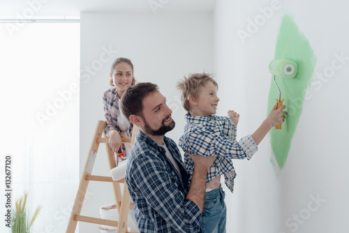 Family painting a room together