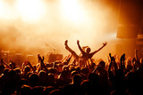 Crowd surfing during at concert