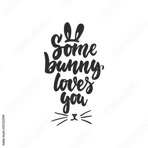 Obraz na płótnie Some bunny loves you - hand drawn Easter lettering phrase isolated on the white background. Fun brush ink inscription for photo overlays, greeting card or t-shirt print, poster design.