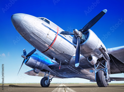  historic airplane on a runway