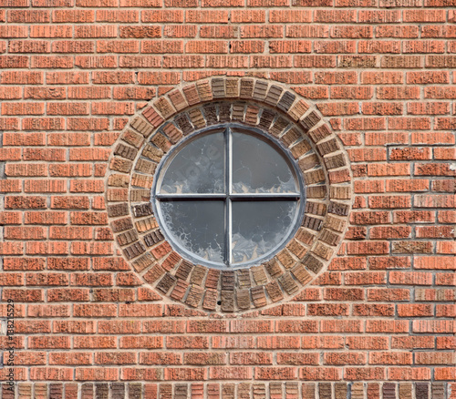 Round Window in Brick Wall