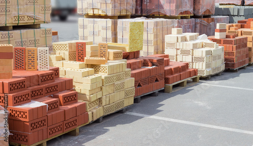 Perforated bricks of different colors and shapes of holes