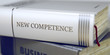 Book Title of New Competence. New Competence Concept on Book Title. Stack of Books Closeup and one with Title - New Competence. Toned Image. 3D Illustration. Book Title of New Competence. New Competence Concept on Book Title. Stack of Books Closeup and one with Title - New Competence. Toned Image. 3D Illustration.