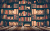 blurred Image many old books on bookshelf in library