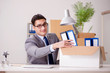 Businessman moving offices after promotion Businessman moving offices after promotion