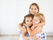 Happy funny girls embrace together Happy funny girls embrace together