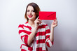 portrait of beautiful young woman with envelope on the wonderful white studio background portrait of beautiful young woman with envelope on the wonderful white studio background