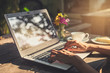 Hand typing on keyboard with cup of coffee Hand typing on keyboard with cup of coffee