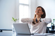 Excited woman working at desk in office. Using antistress ball. Excited woman working at desk in office. Using antistress ball.