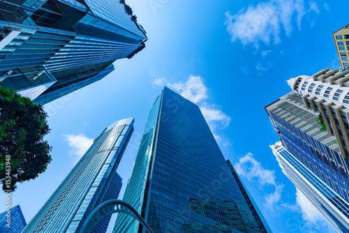 Business skyscrapers in downtown and skies.