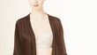 Woman in lingerie and black bath robe, on white Woman in lingerie and black bath robe, on white