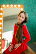 Portrait beautiful teenger girl in red dress. Close up Portrait beautiful teenger girl in red dress. Close up