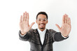 Young african man showing hands. Young african man showing hands.
