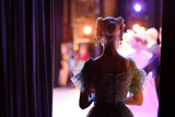 A ballerina awaiting the moment of entering the stage in the play