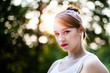 Sunlit Cute Girl in a White Summer Dress Sunlit Cute Girl in a White Summer Dress