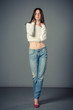 Young woman casual studio portrait in white top Young woman casual studio portrait in white top