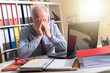 Tired businessman with headache, light effect Tired businessman with headache, light effect